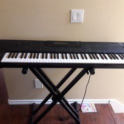 Korg I2 Digital Piano.