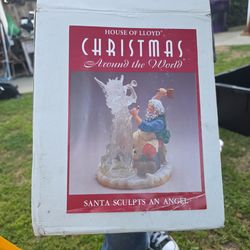 House of Lloyd Santa Carving an Angel