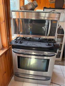 Kenmore stove and over the range microwave