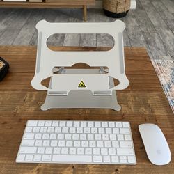 Apple Keyboard, Apple Mouse, And Laptop Stand