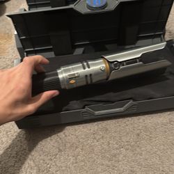 Disney land Darth Tyranus and Cal Kestis lightsaber Handel and box