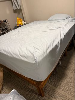 Queen mattress and bed frame in perfect condition