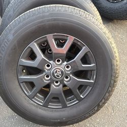 Bridgestone dueler tires with Toyota wheels