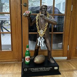 Dos Equis Sports Football Statue.