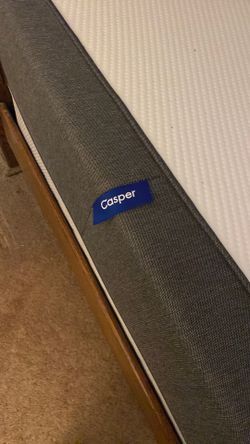 Queen sized bed with Casper foam mattress and box spring