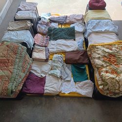 Colchas, almohadas, fundas,  Chamarras,  Sombreros 