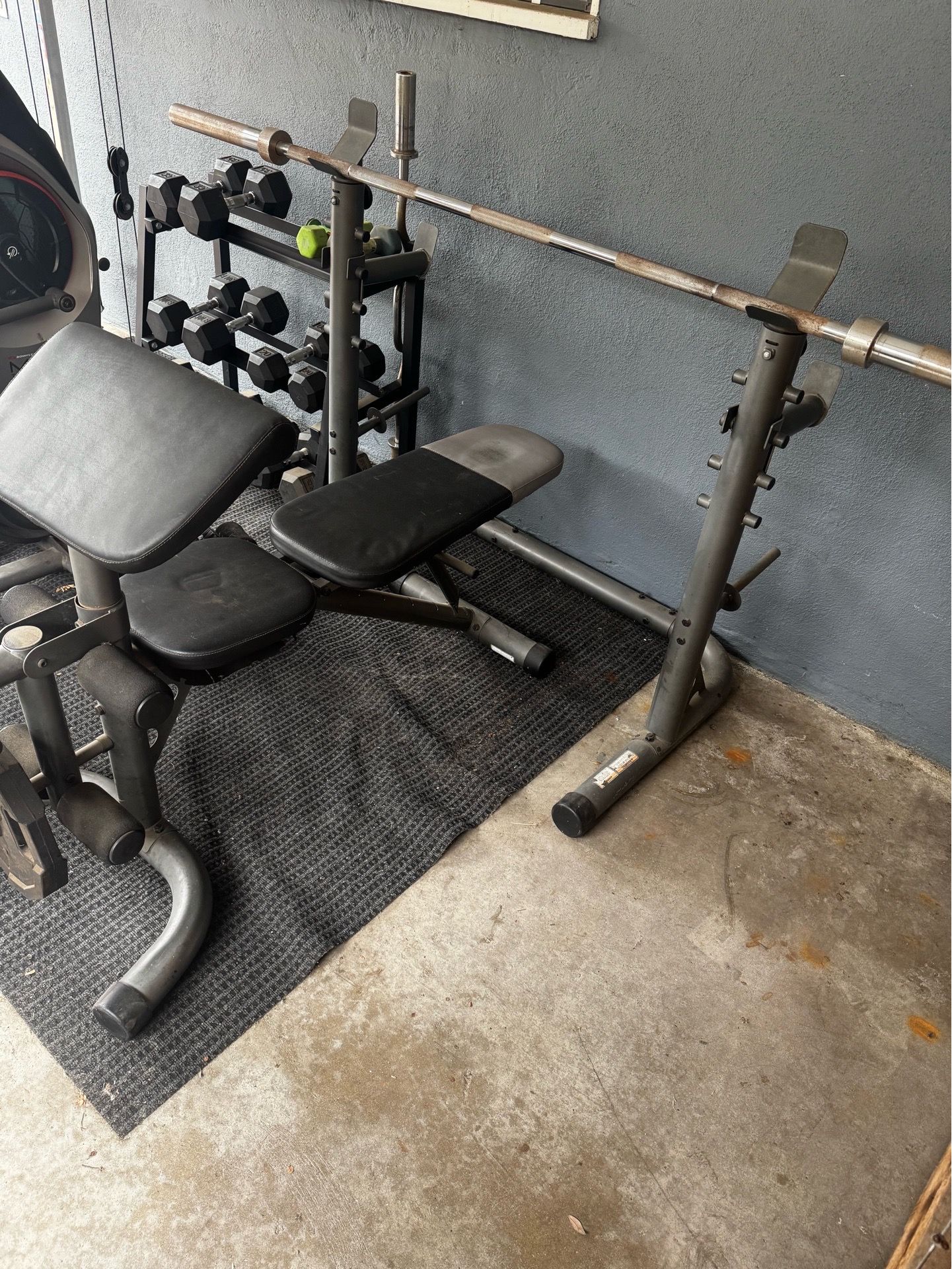 Weight bench and barbell