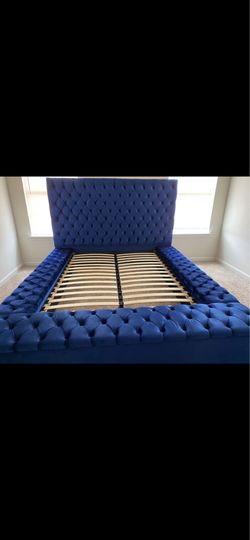 Blue upholstered platform bed frame