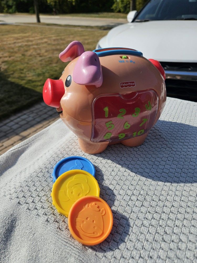 Fisher Price Piggy W Coins. Battery Operated