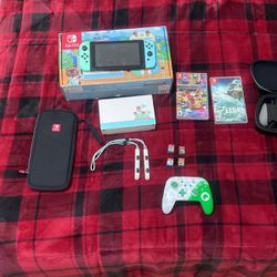 Nintendo Switch Animal Crossing edition (WITH BOX AND EXTRA GAMES + CONTROLLER)