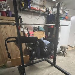 Squat Rack, Barbell, and Weights
