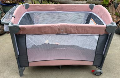 Pink & gray baby play yard
