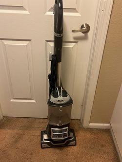 Shark vacuum. (Yes it does still work)