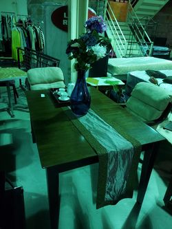 Dining table with 4 chairs and a leaf