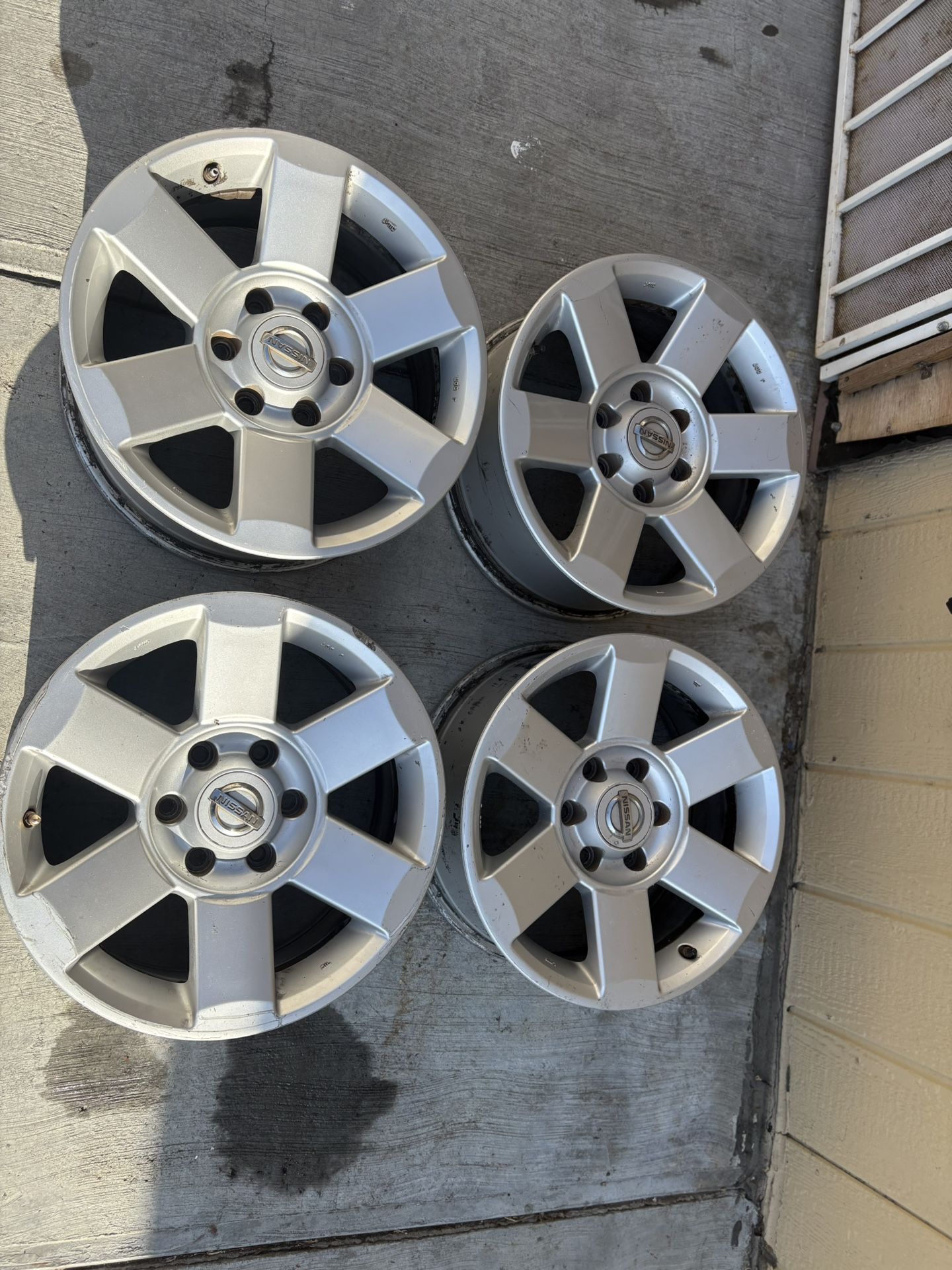 Nissan Hardbody wheels 18x8 silver aluminum 6 Spoke