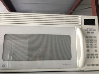 Ge white over the range microwave oven