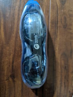 Swimming Goggles And Ear Plugs