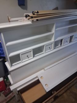 Cal king bed head board with shelfs.