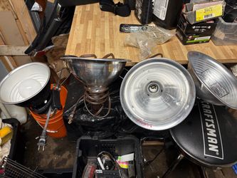 4 Clamp heat lamps/ lights works good for livestock or for hanging lights $20