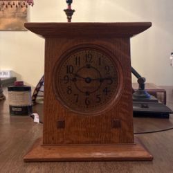 a Stickley Prairie Mantel Clock crafted in solid oak with Arts & Crafts style details