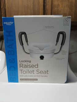 Locking raised toilet seat