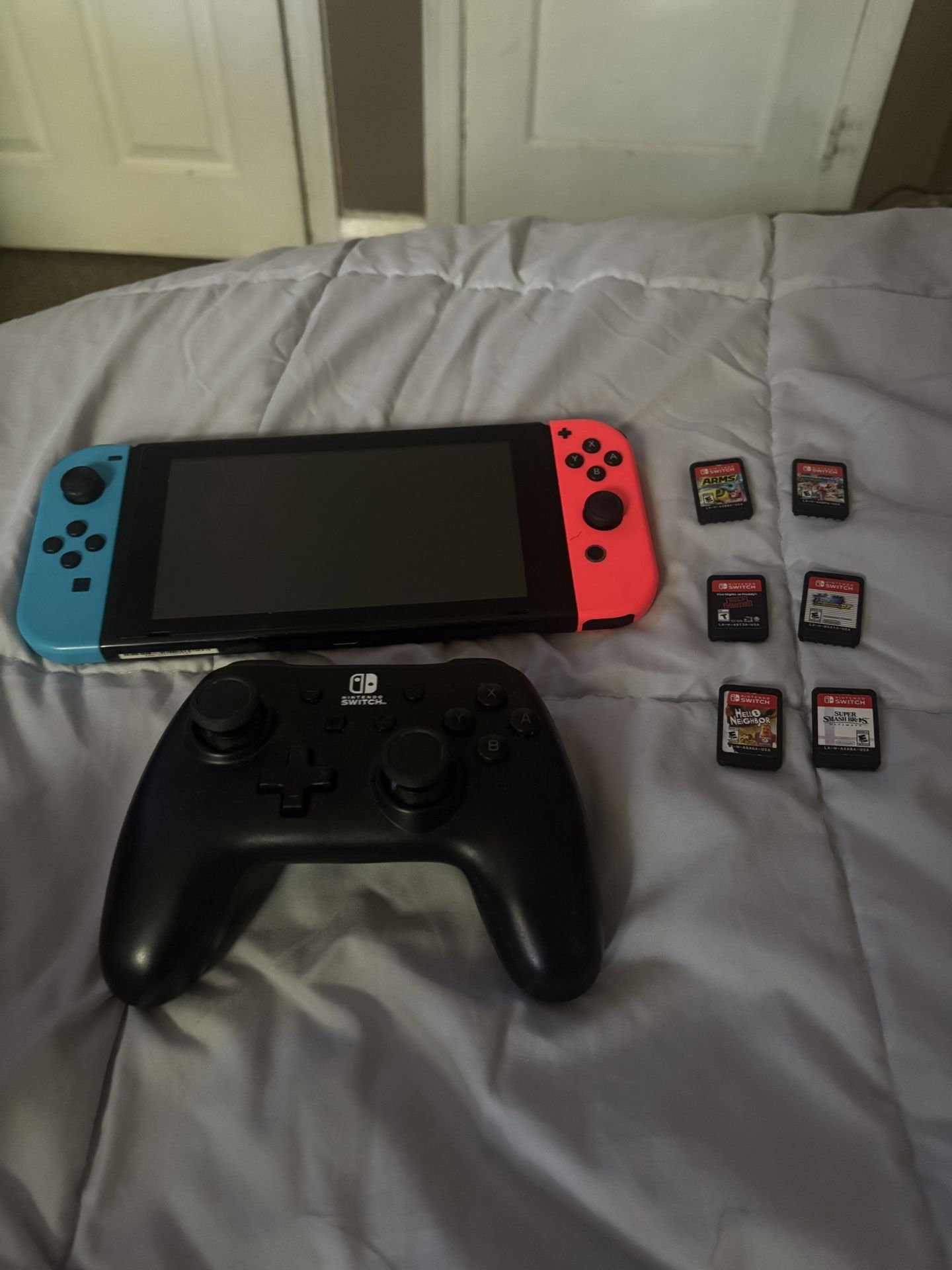 Nintendo Switch With Wired Pro Controller And Comes With Super Smash Bros, Pokémon Fighting, Mario Kart, Help Wanted,hello Neighbor, Arms,