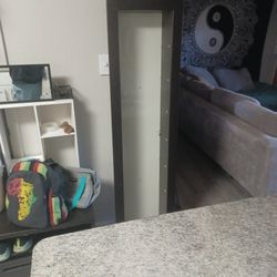 Long Glass Cabinet, Needs To Be Hung From Wall. It Has 7 Glass Shevles, 《Not Pictured》