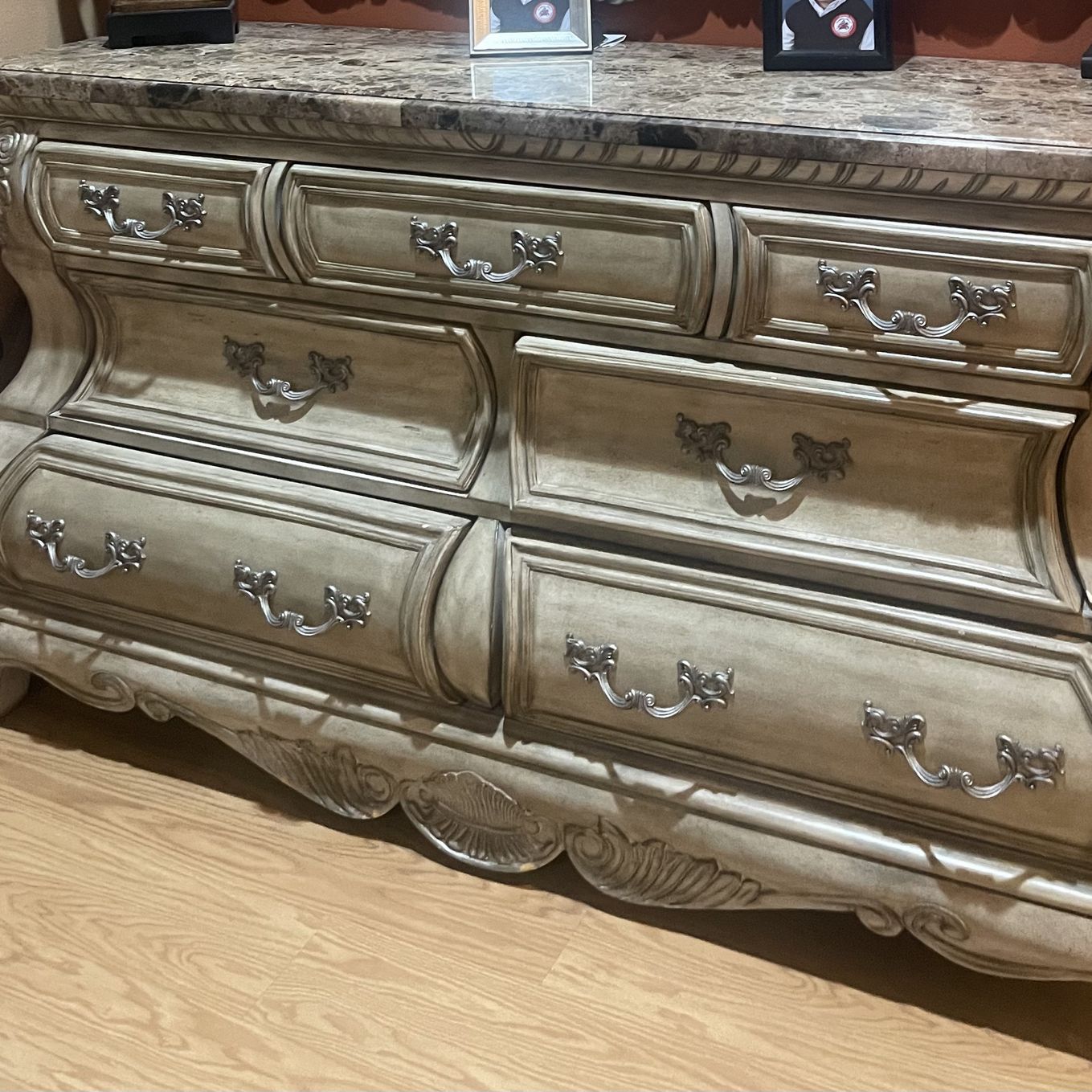Bedroom set including a bed, two nightstands (with granite tops), and a dresser (without a mirror) featuring drawers and a granite top. The set is in