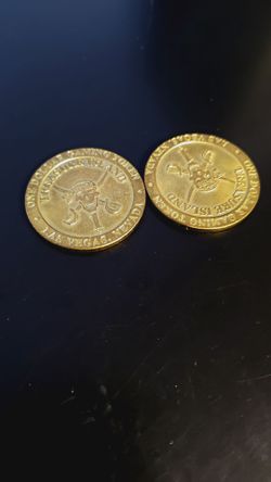 Two treasure Island gaming tokens