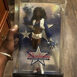 Collectible Dallas Cowboys antique doll