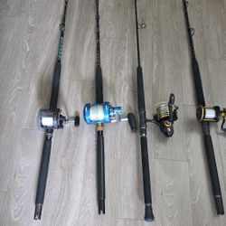 Four Fishing Rods With Reels