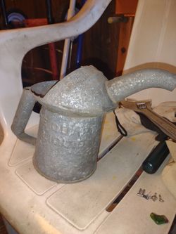Antique auto shop oil can