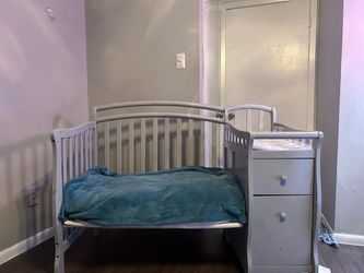Gray Baby Crib with Attached Changing Table