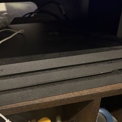 PS4 with controllers & games