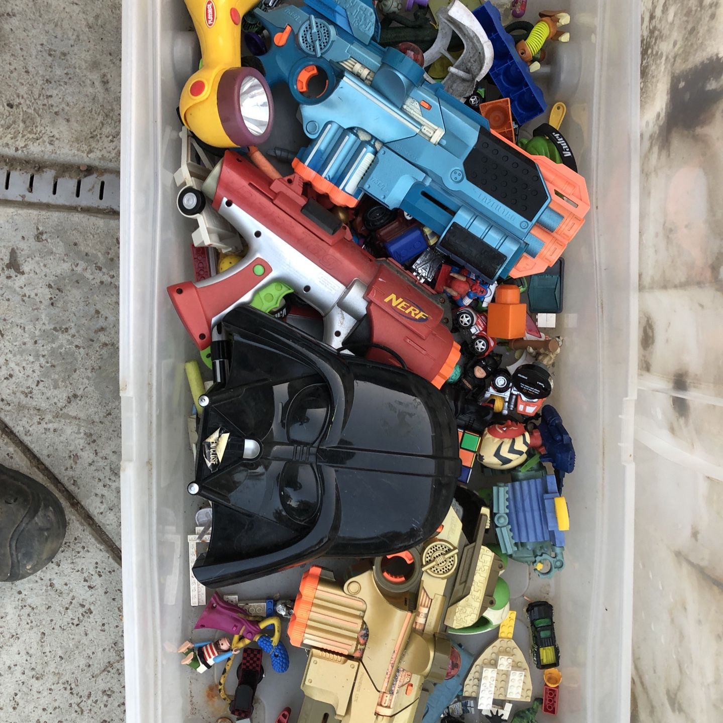 Miscellaneous box of toys from Star Wars and Nerf guns and a bunch other toys