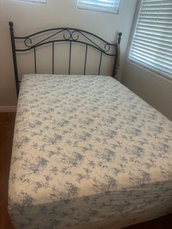 Free Full size bed nice iron frame with box and mattress.  Needs to be picked up.