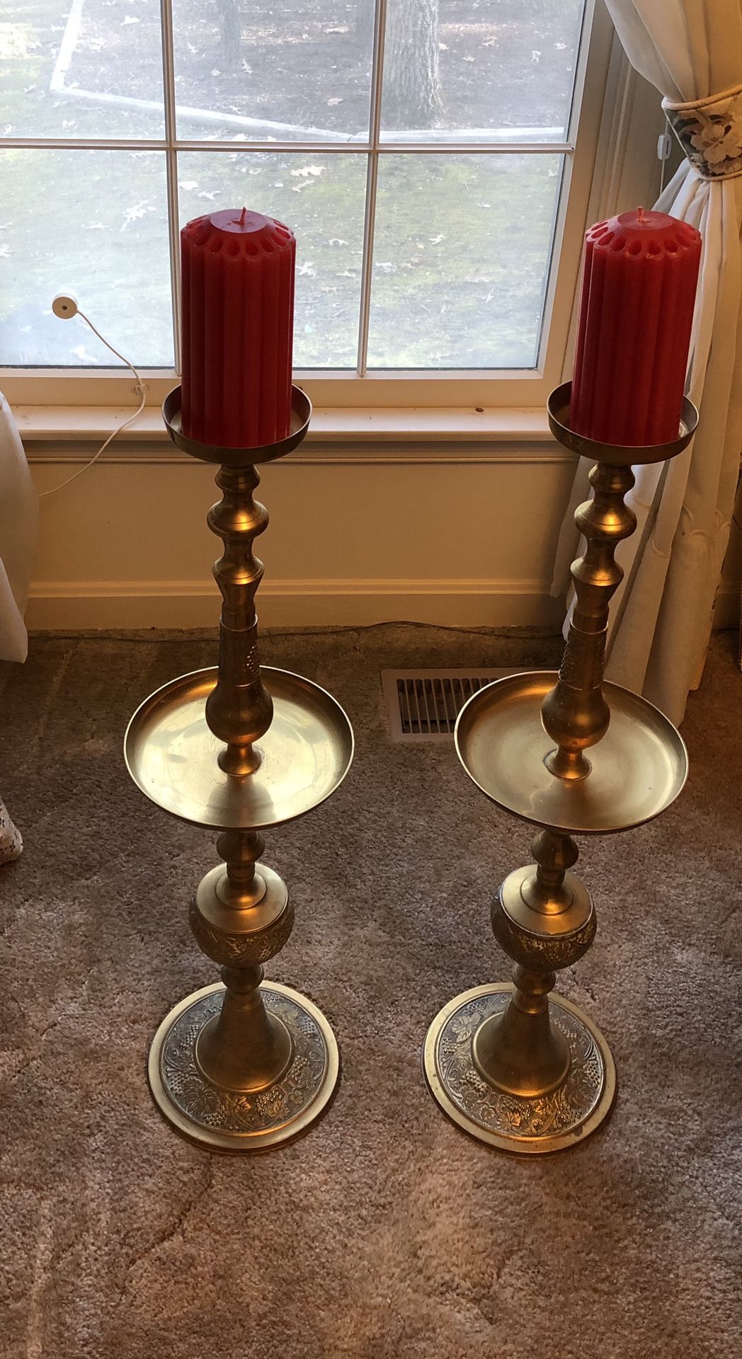 Two tall Brass candlesticks-approximately 3’ tall