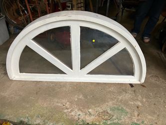 Wooden arched window