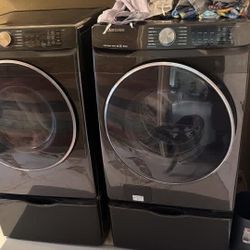 Samsung Front Loading Washer And Electric Dryer With Pedestals 