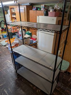 Heavy Duty Metal Shelving Unit (900 Pound capacity) 4 shelves, HD-Casters plus Plexiglass shelf overlay's