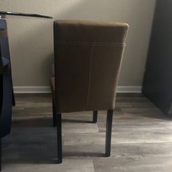 4 brown kitchen chairs