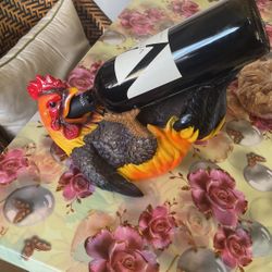 Rooster to hold bottle
