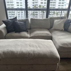American Signature grey couch and ottoman