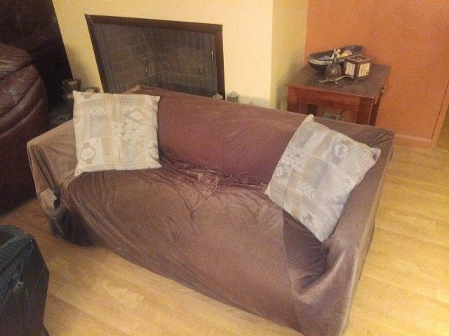 Old loveseat w/ Cover