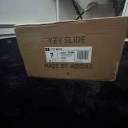 Yeezy Slides -7 Men’s - 8.5 women’s 