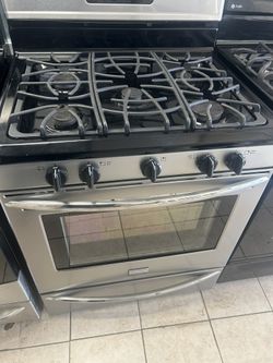 Stainless Steel Five, Burner Gas Stove & Fridge