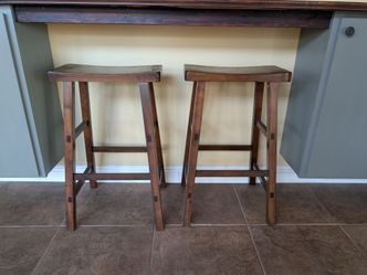 Saddle style bar stools