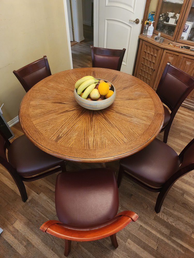 ROUND/OVAL DINING TABLE W/24" EXTENSION 
