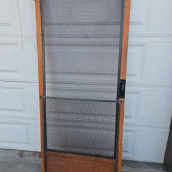 Screen Door.   WITH HEDGES  METAL Bottom 