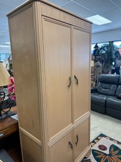 Light Wood Armoire with Decorative Handles